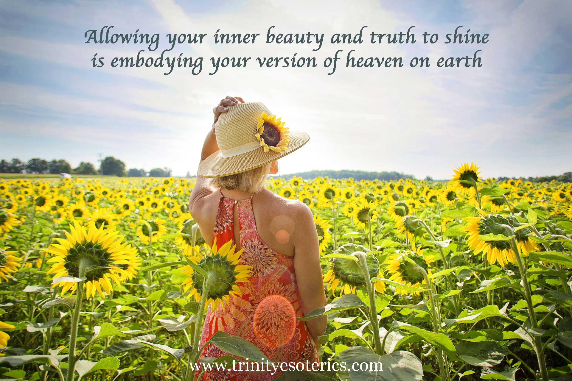 woman in field of sunflowers trinity esoterics