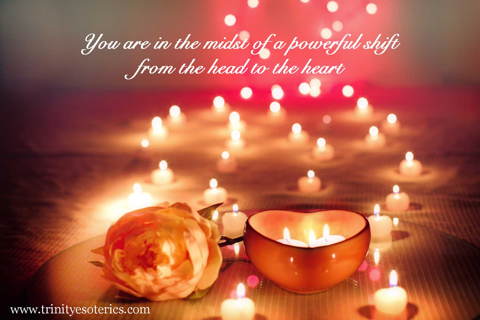 heart candle illuminated trinity esoterics