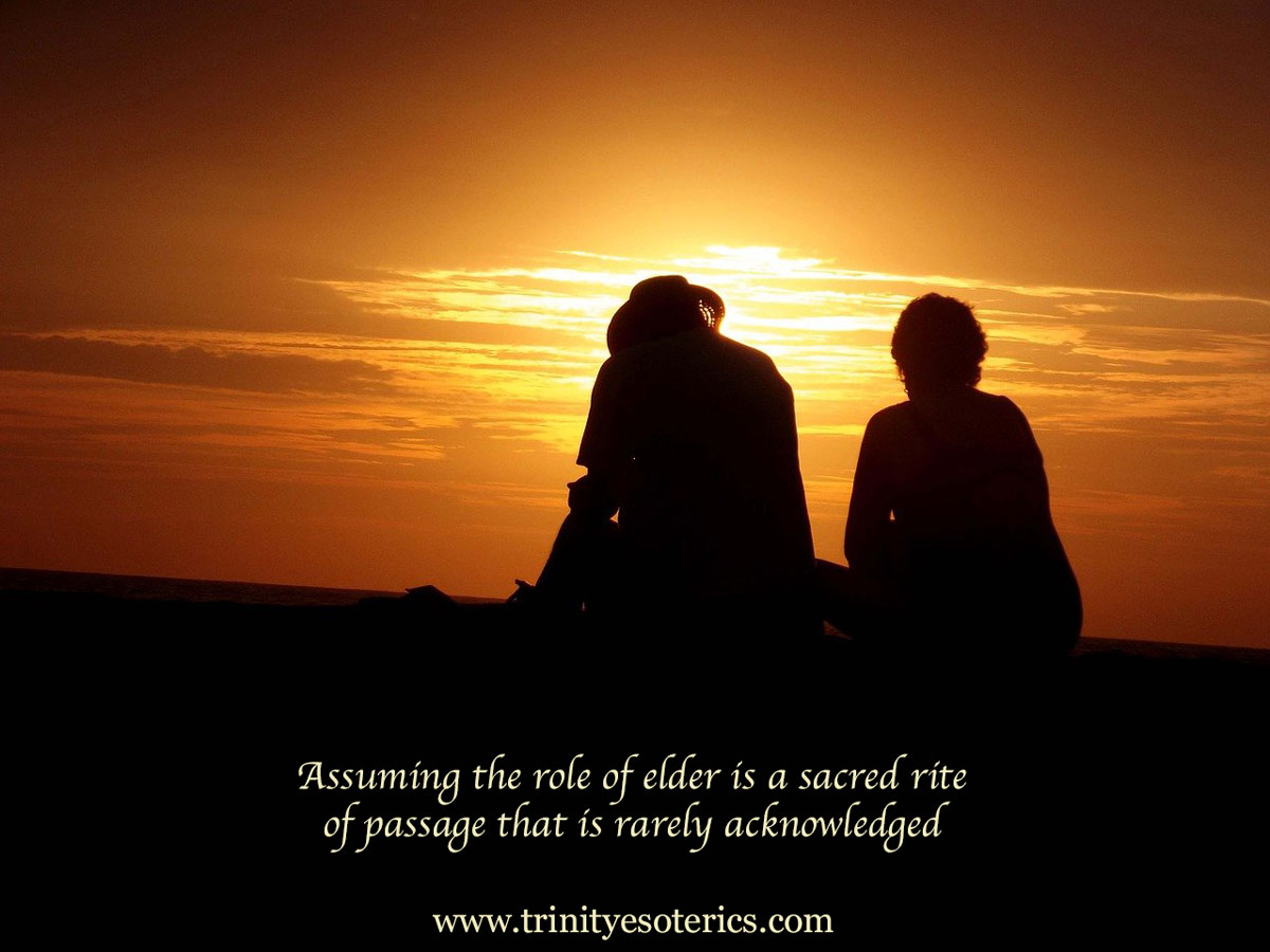 older couple sitting at sunset trinity esoterics