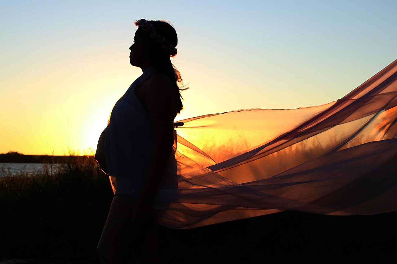 silhouette of a pregnant woman trinity esoterics