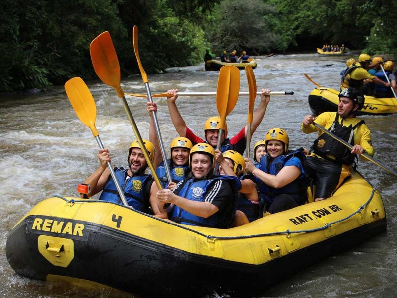 smiling people in raft trinity esoterics