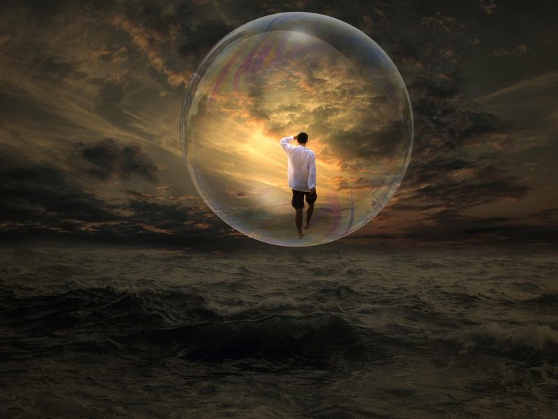 man in bubble above the density trinity esoterics