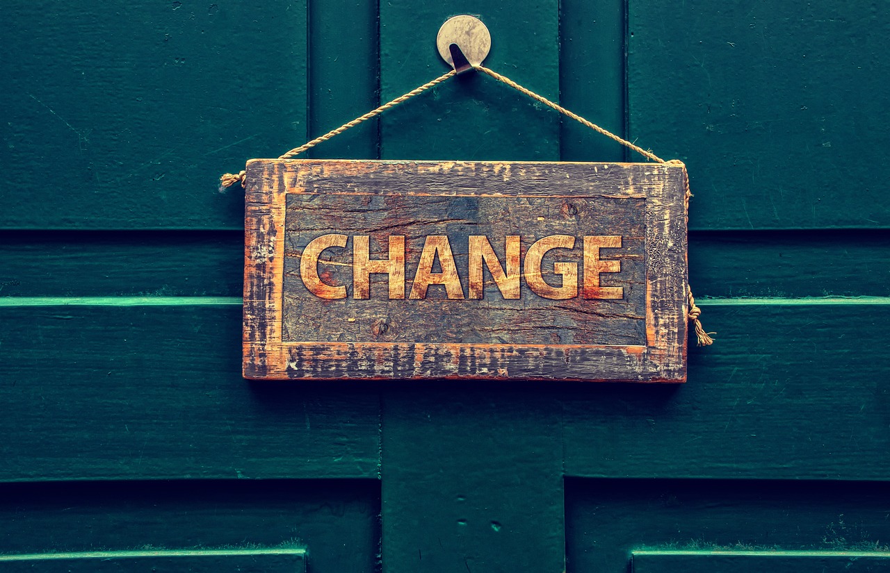 sign that says change trinity esoterics